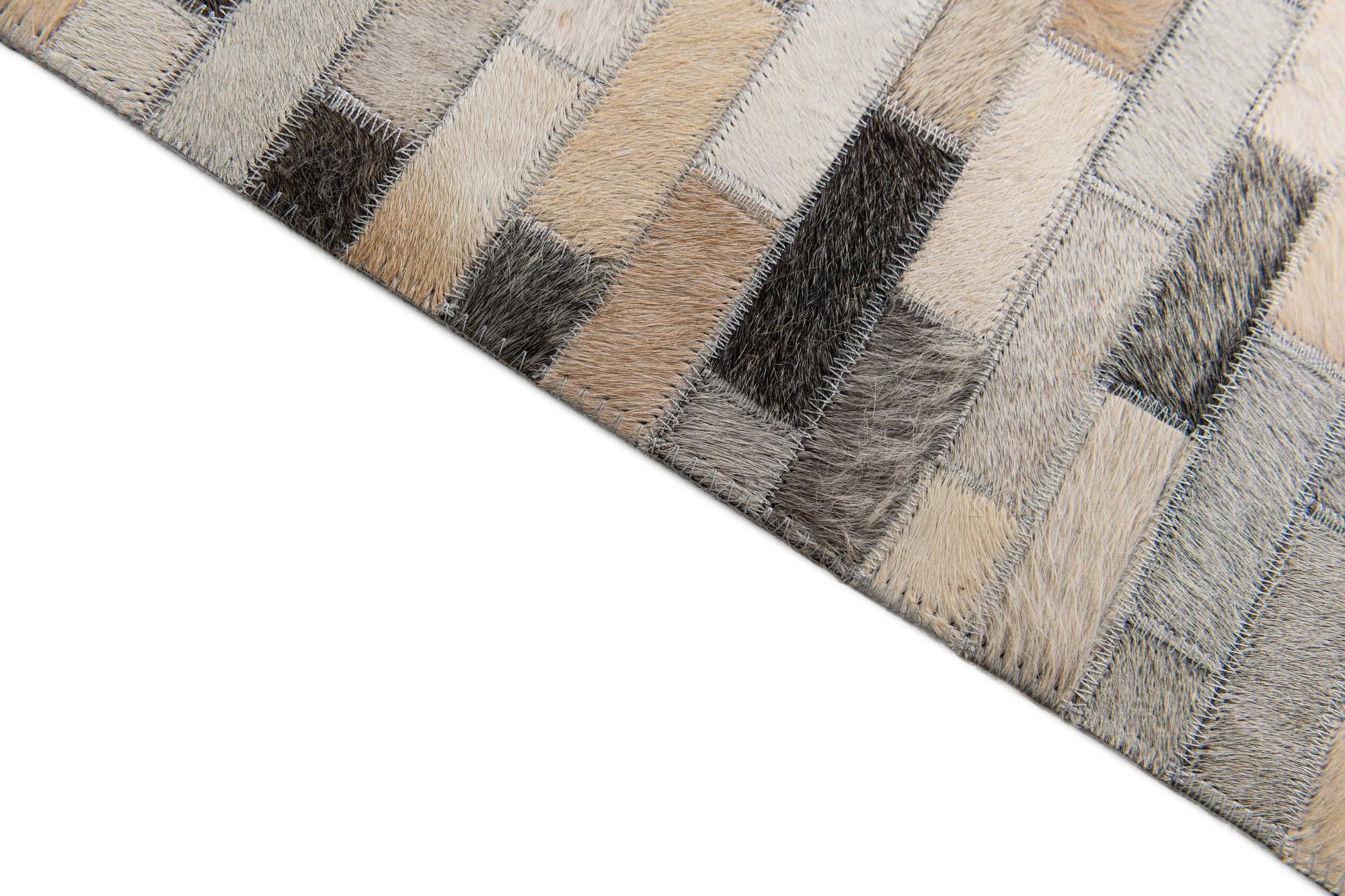 6' 7 x 10' Cowhide Stocks Rug