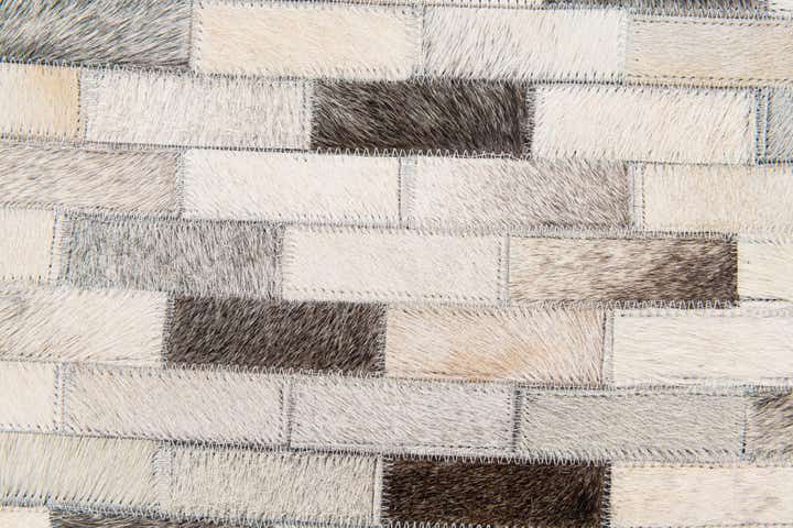 6' 7 x 10' Cowhide Stocks Rug