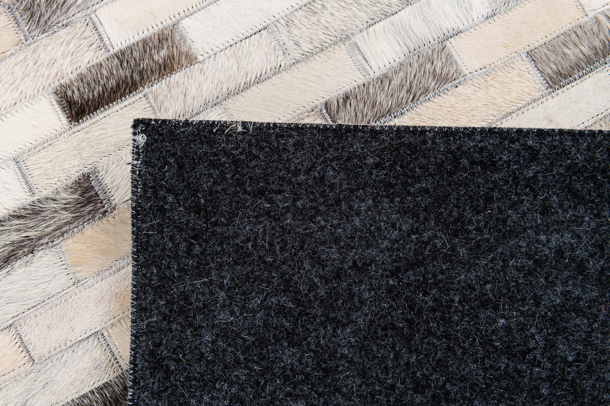 6' 7 x 10' Cowhide Stocks Rug
