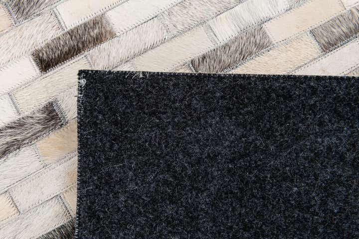 6' 7 x 10' Cowhide Stocks Rug