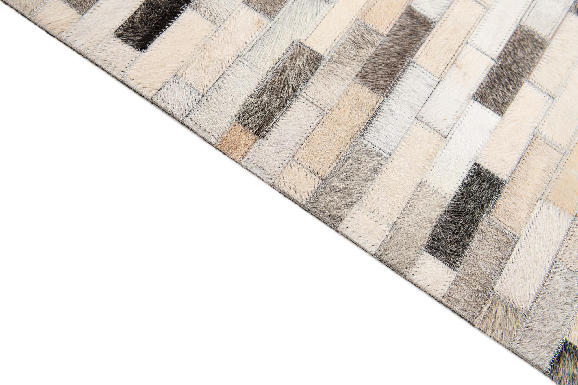6' 8 x 10' Cowhide Stocks Rug