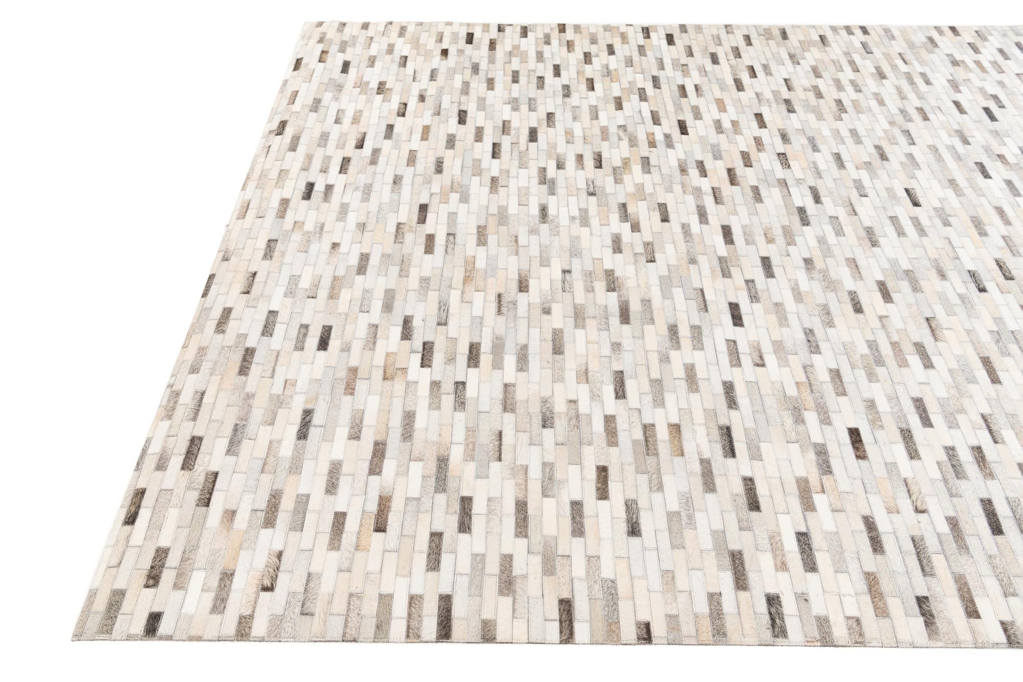 6' 8 x 9' 11 Cowhide Stocks Rug