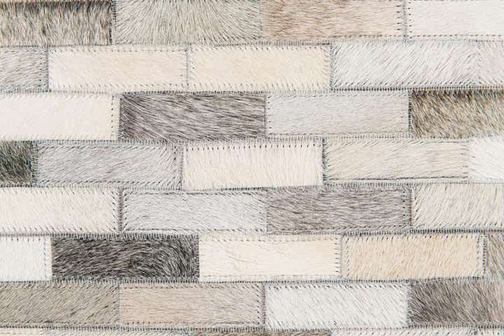 6' 8 x 9' 11 Cowhide Stocks Rug