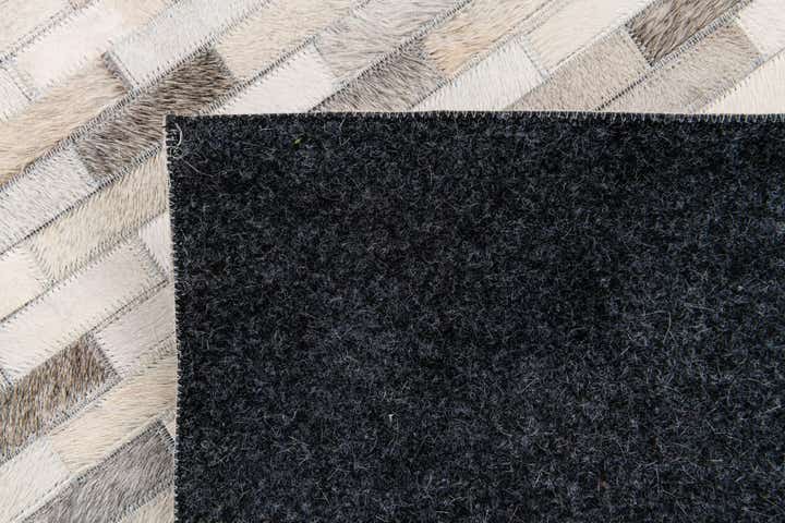 6' 8 x 9' 11 Cowhide Stocks Rug