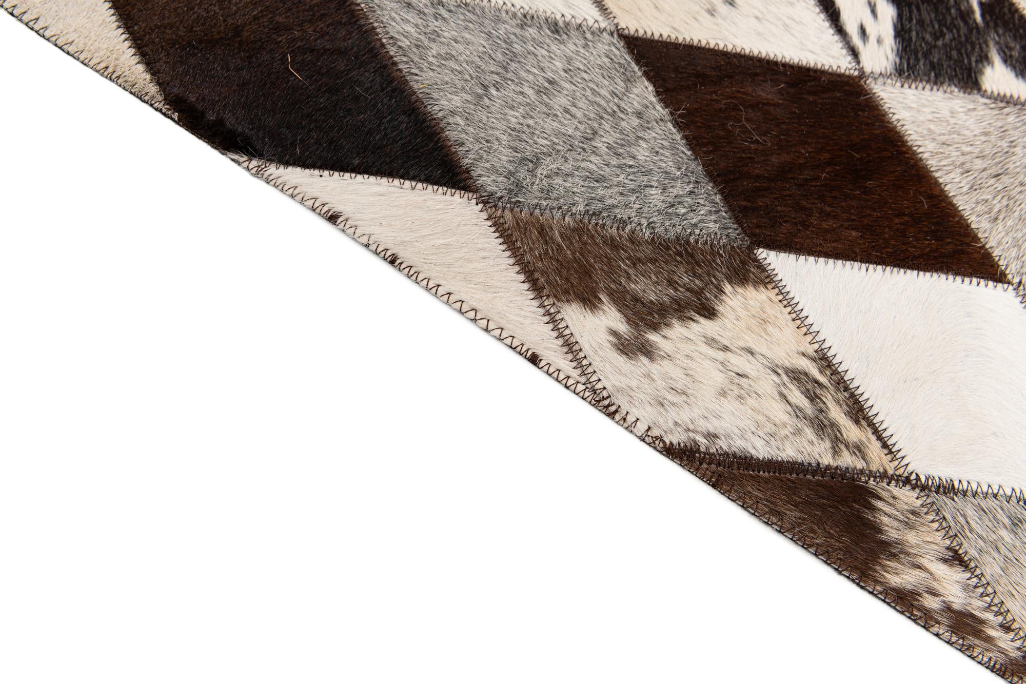 6' 7 x 9' 9 Cowhide Stocks Rug