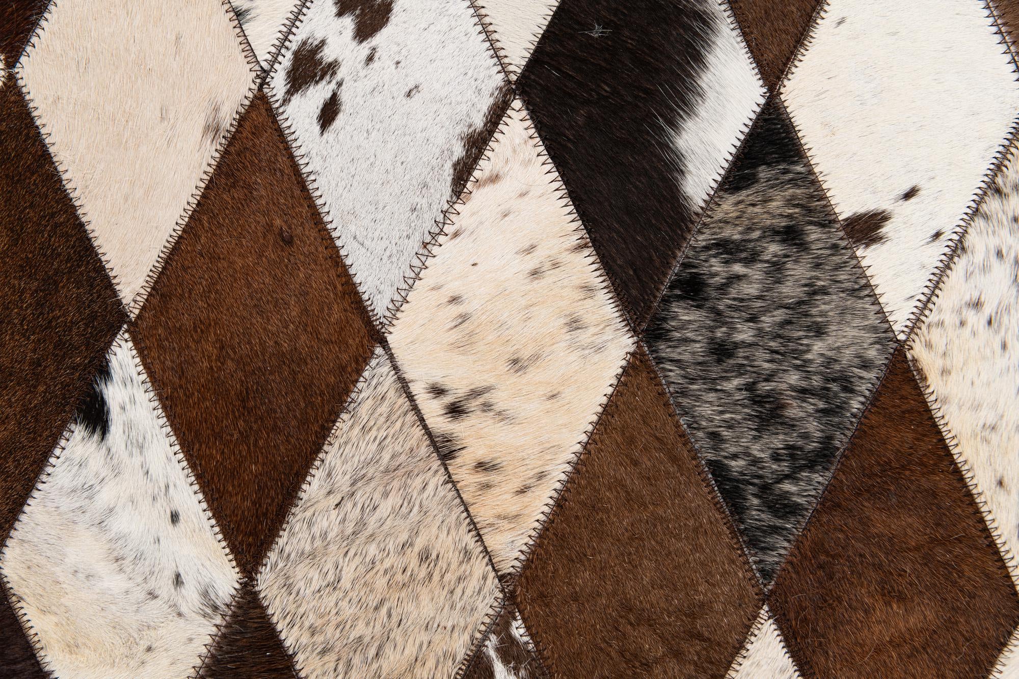 6' 7 x 9' 9 Cowhide Stocks Rug