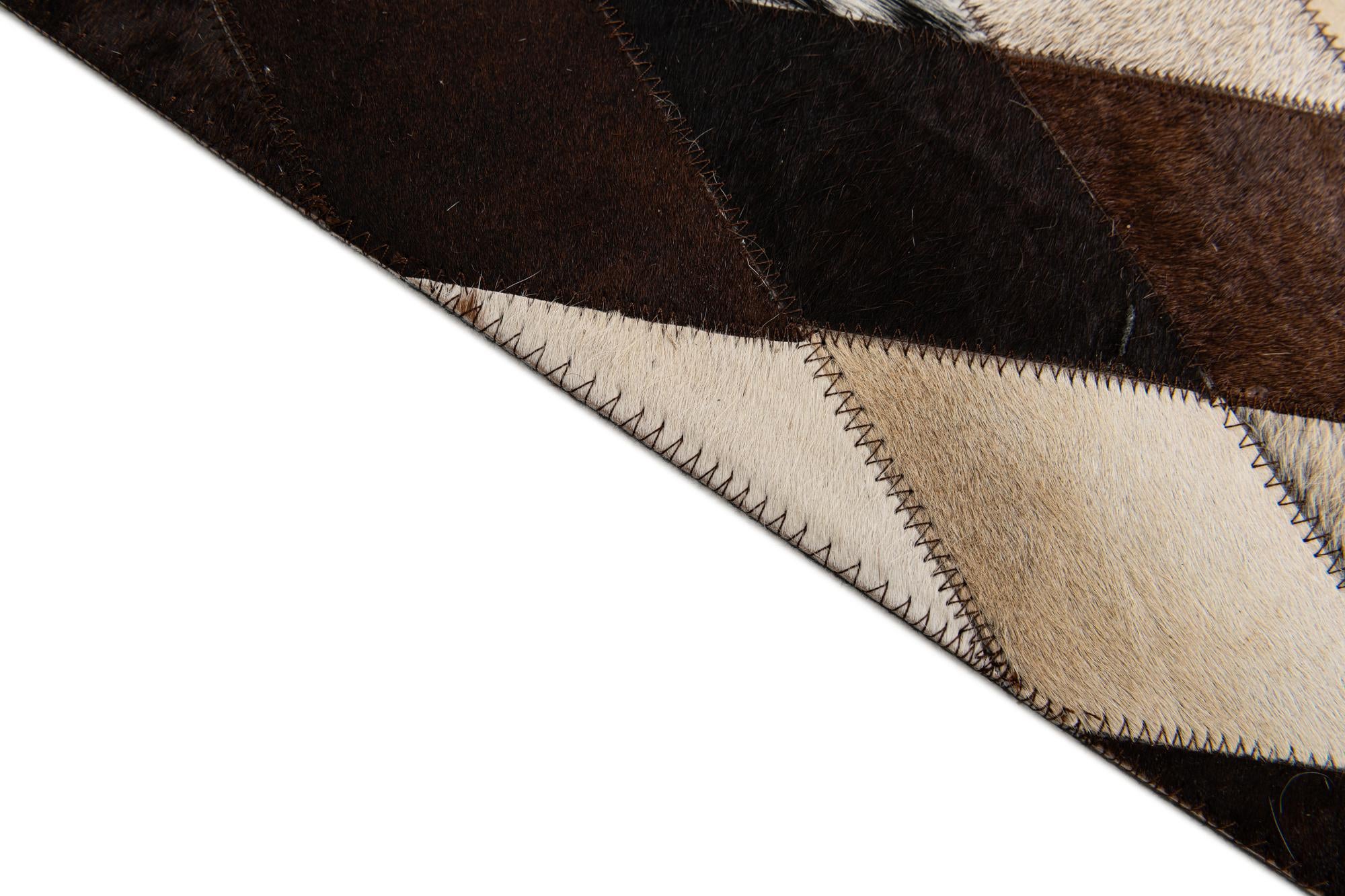 6' 7 x 9' 10 Cowhide Stocks Rug