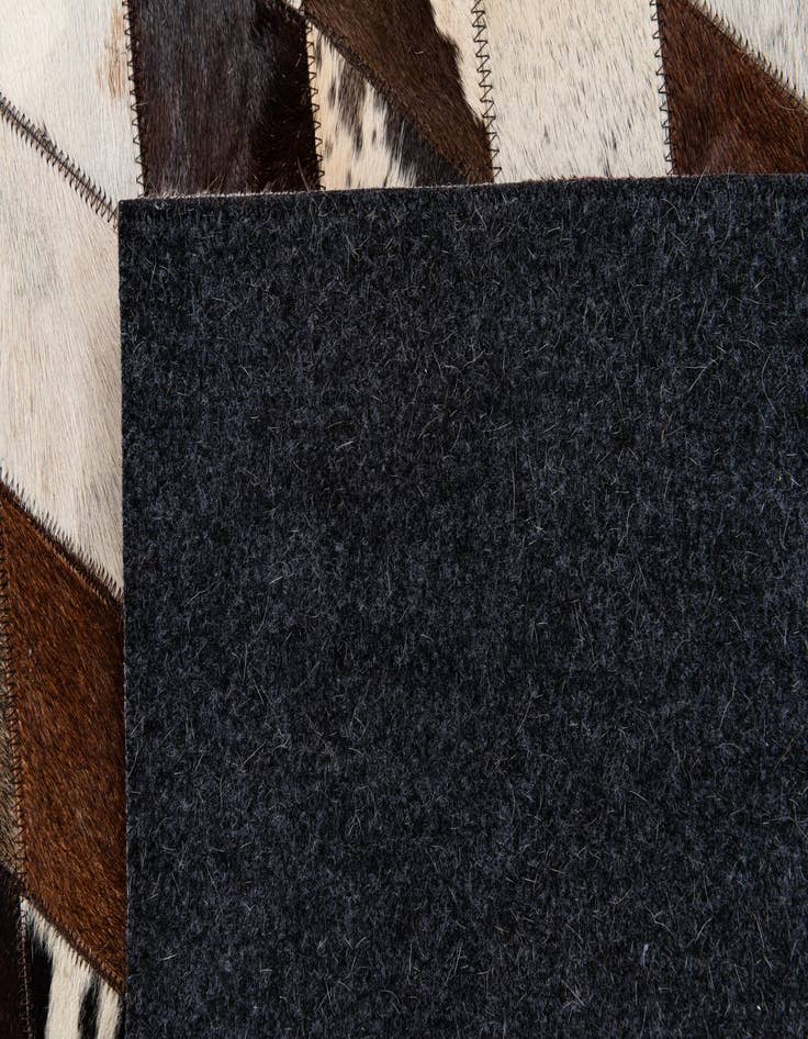 Detail image of 6' 6 x 9' 10 Cowhide Stocks Rug