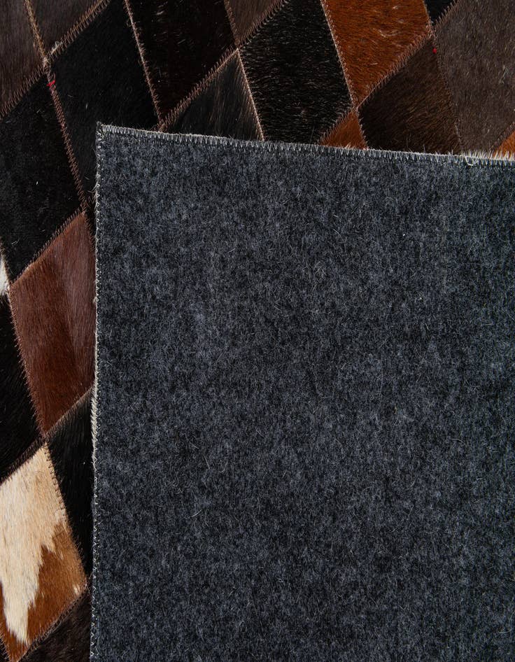 Detail image of 5' x 8' Cowhide Stocks Rug