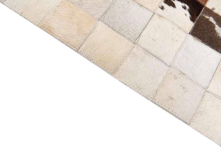 5' x 7' 11 Cowhide Stocks Rug