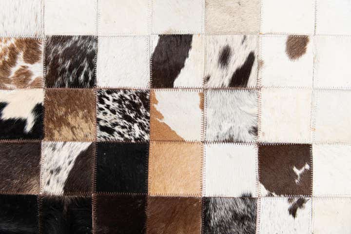 5' x 7' 11 Cowhide Stocks Rug