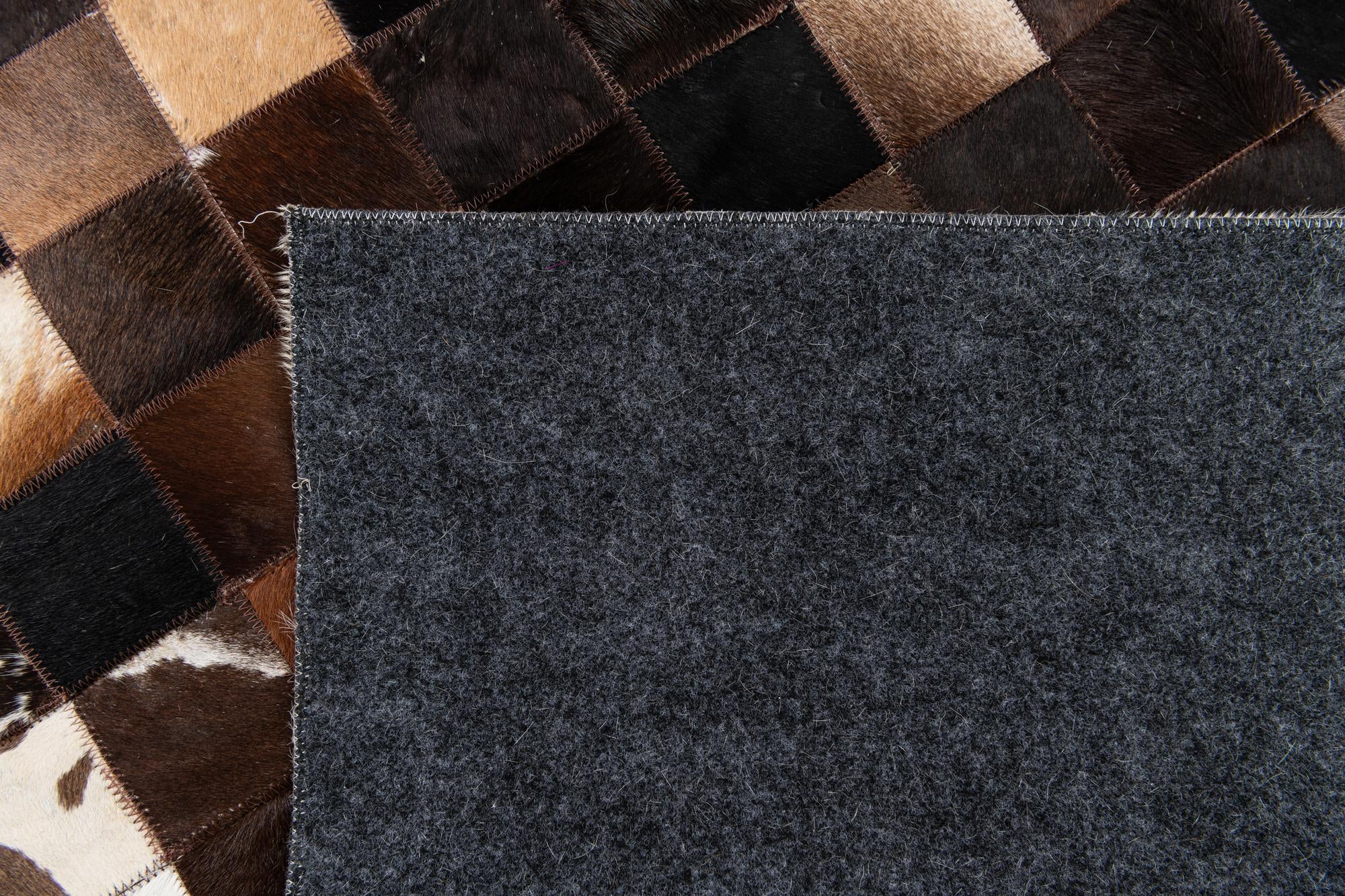 5' x 7' 11 Cowhide Stocks Rug