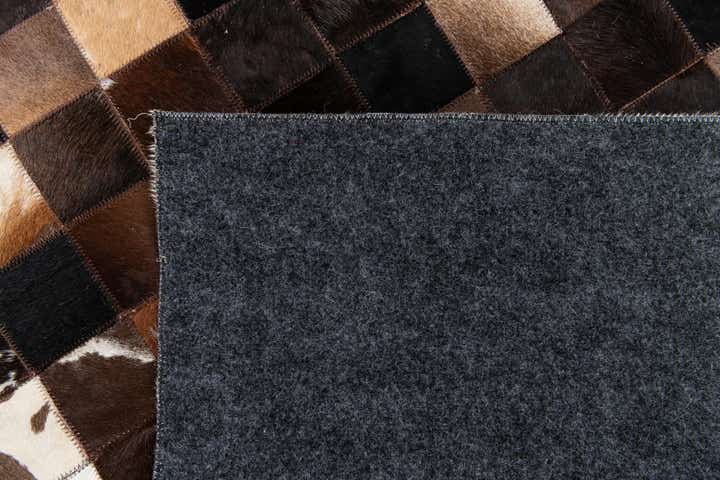 5' x 7' 11 Cowhide Stocks Rug
