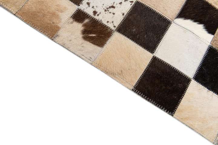5' 2 x 7' 11 Cowhide Stocks Rug