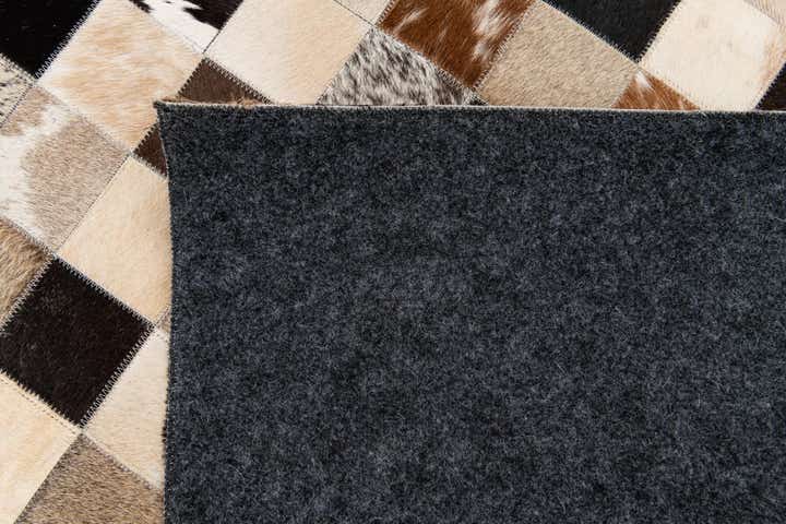 5' 2 x 7' 11 Cowhide Stocks Rug