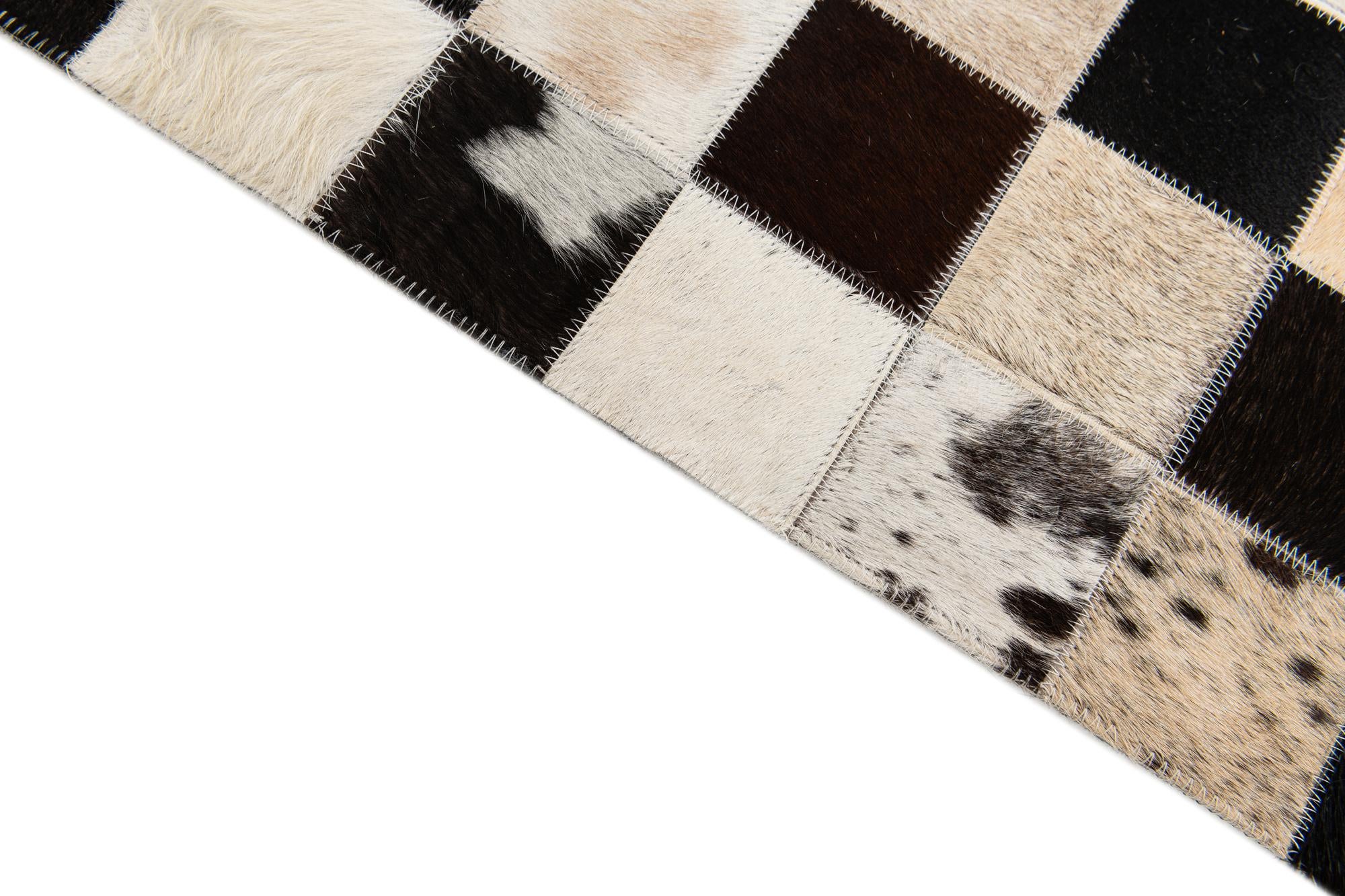 5' 2 x 8' Cowhide Stocks Rug