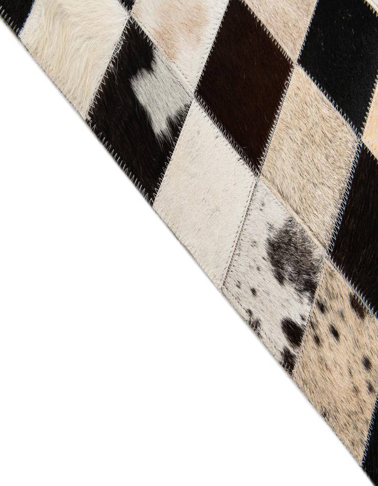 Detail image of 5' 2 x 8' Cowhide Stocks Rug