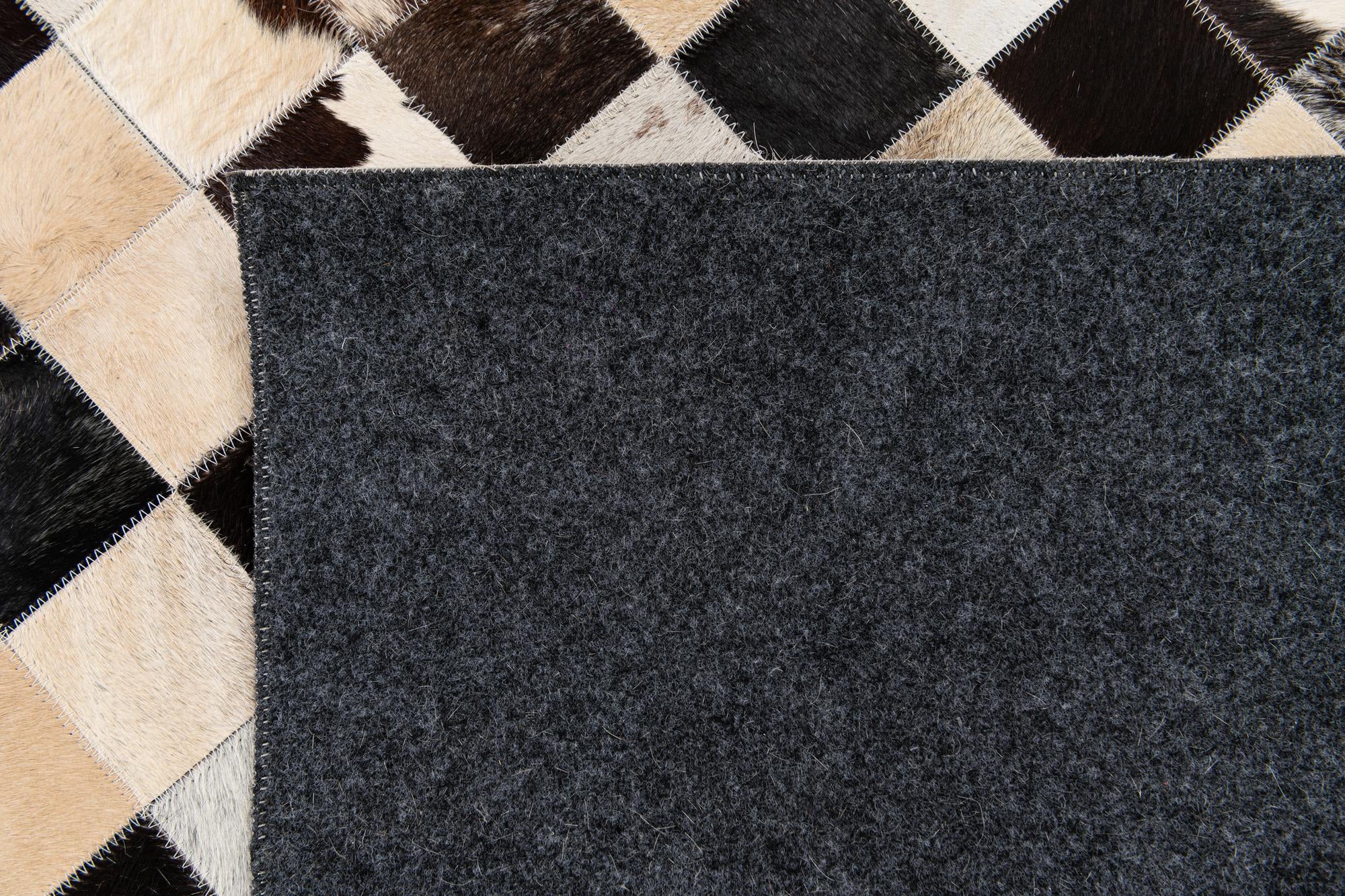 5' 2 x 8' Cowhide Stocks Rug