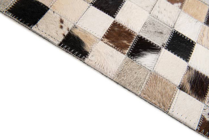 Detail image of 5' x 7' 10 Cowhide Stocks Rug