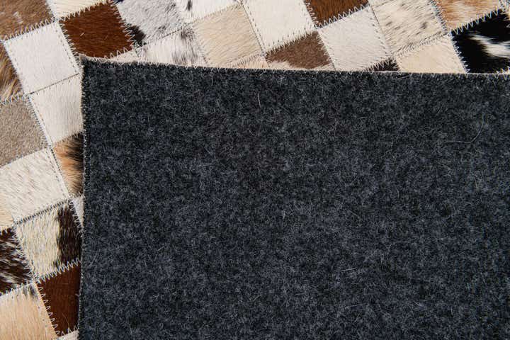 5' x 7' 10 Cowhide Stocks Rug