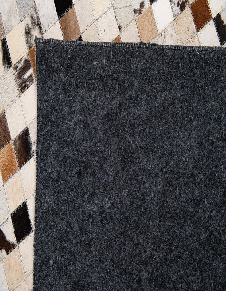 Detail image of 5' 1 x 7' 10 Cowhide Stocks Rug