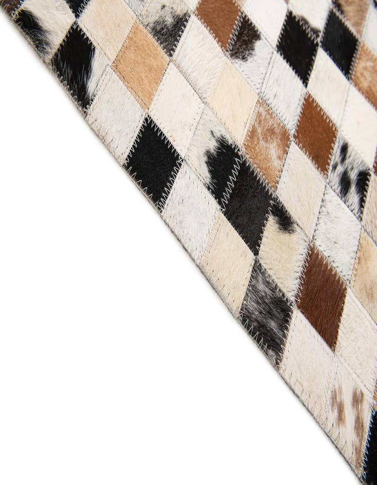 Detail image of 5' x 7' 10 Cowhide Stocks Rug