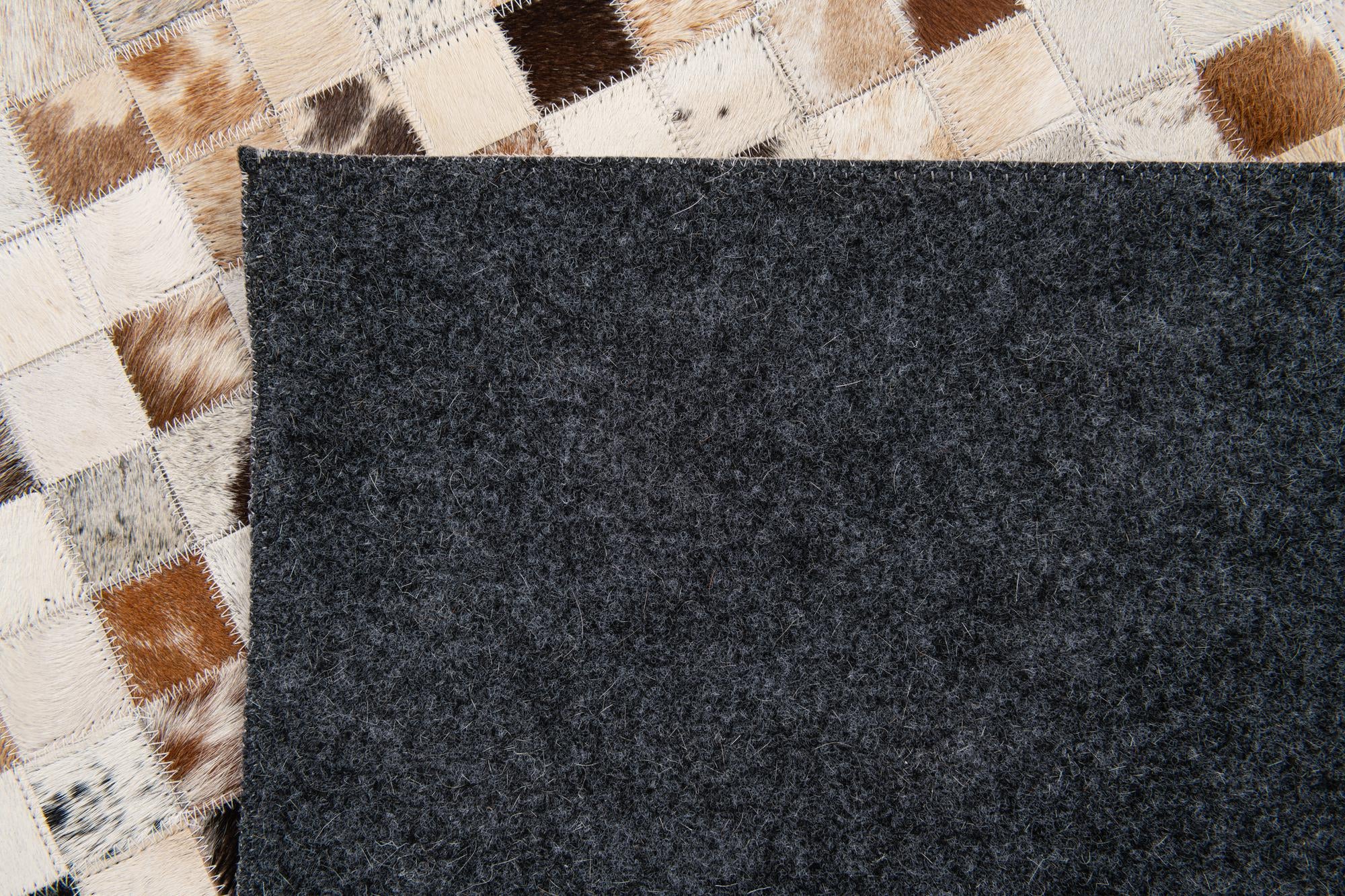 5' x 8' Cowhide Stocks Rug