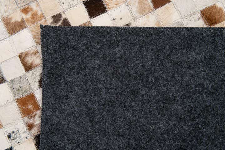 5' x 8' Cowhide Stocks Rug