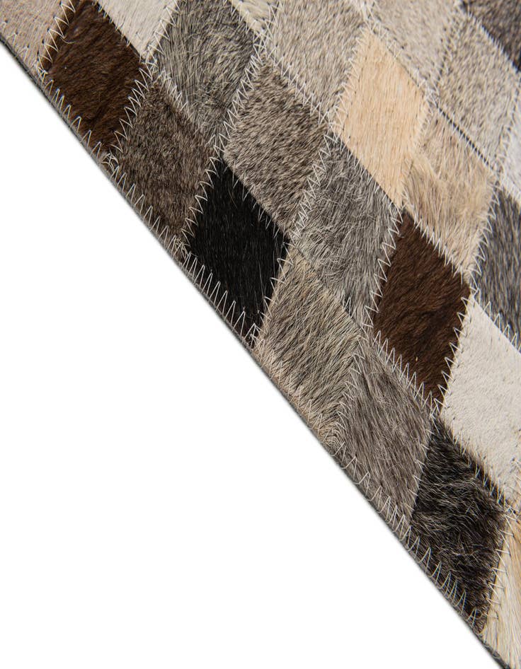 Detail image of 5' 2 x 7' 6 Cowhide Stocks Rug