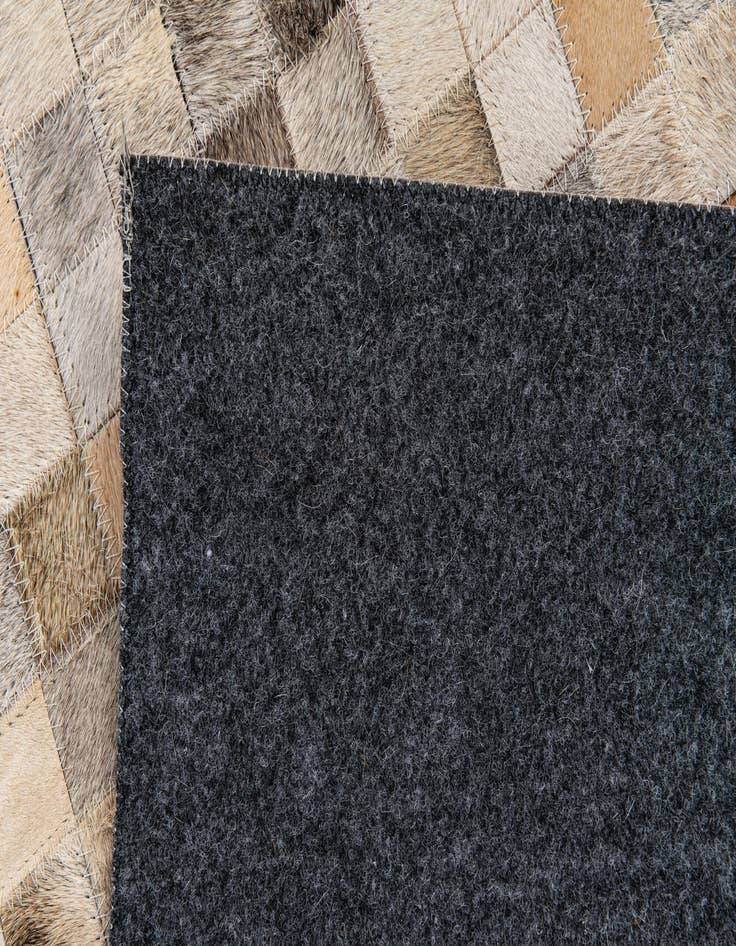 Detail image of 5' 2 x 7' 6 Cowhide Stocks Rug