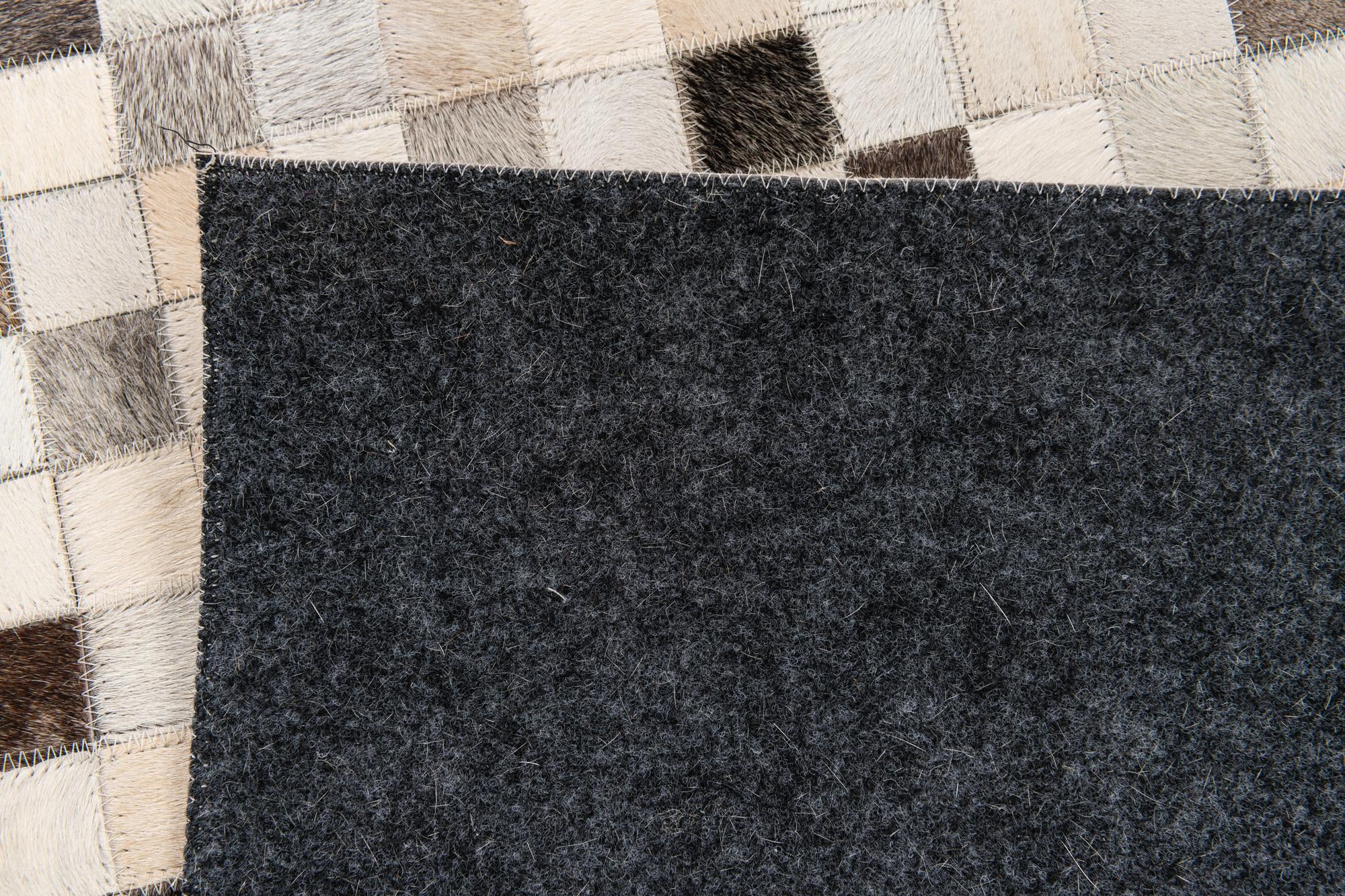 5' x 8' Cowhide Stocks Rug