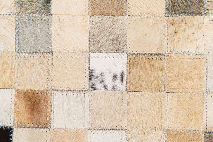 5' 3 x 7' 7 Cowhide Stocks Rug