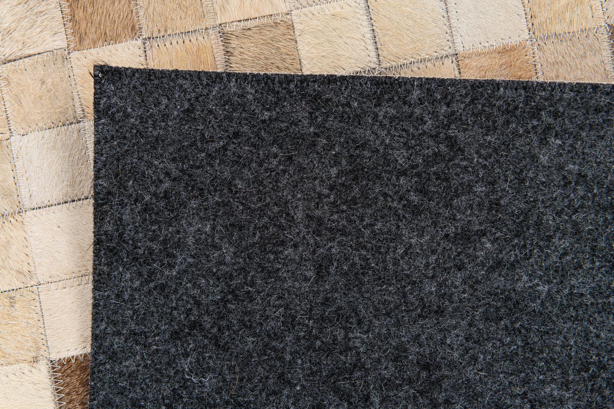 5' 3 x 7' 7 Cowhide Stocks Rug