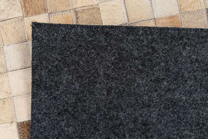 5' 3 x 7' 7 Cowhide Stocks Rug