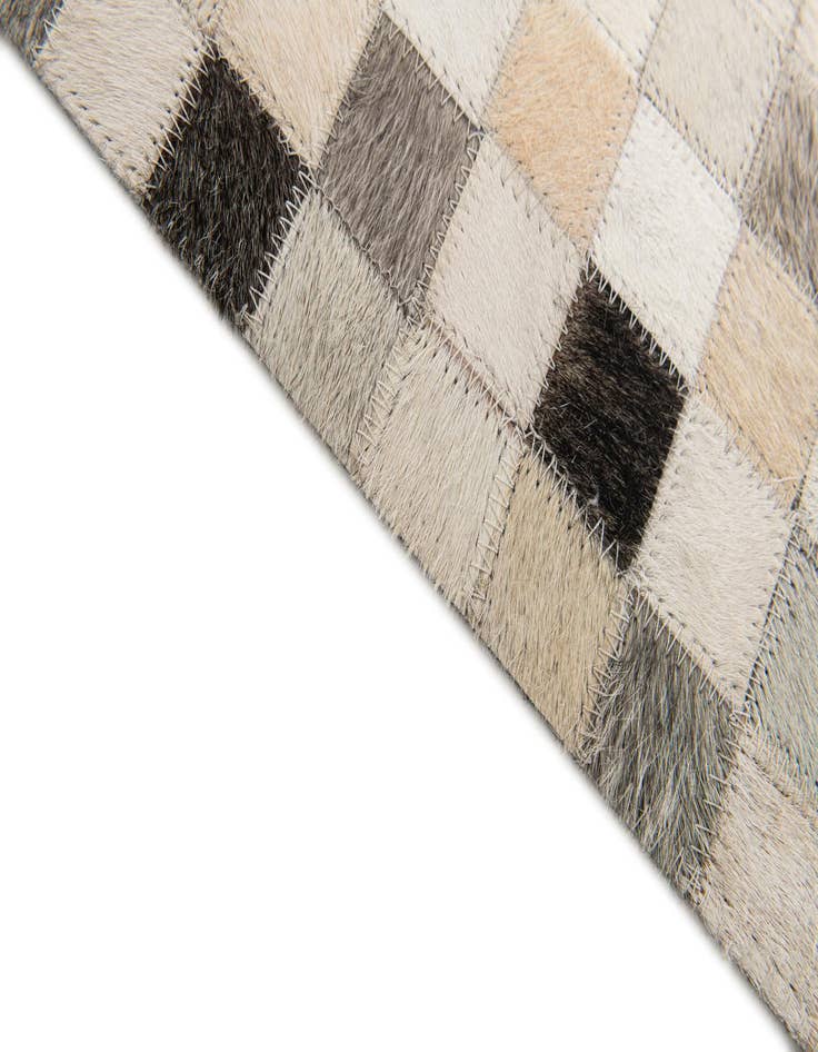 Detail image of 5' x 7' 11 Cowhide Stocks Rug