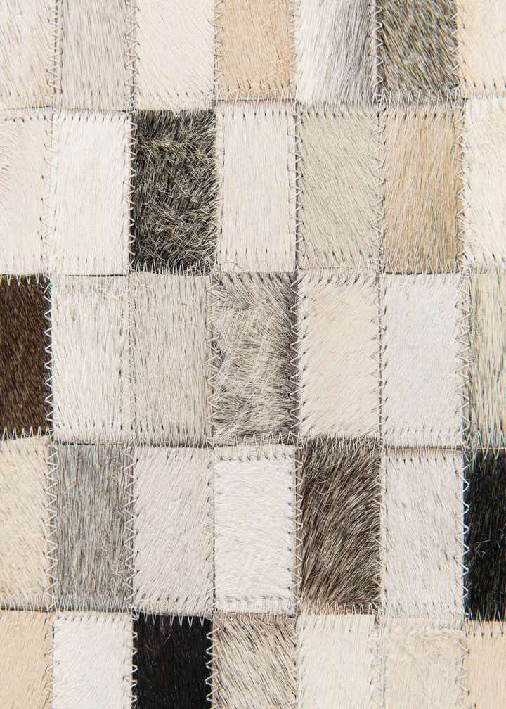 5' x 7' 11 Cowhide Stocks Rug