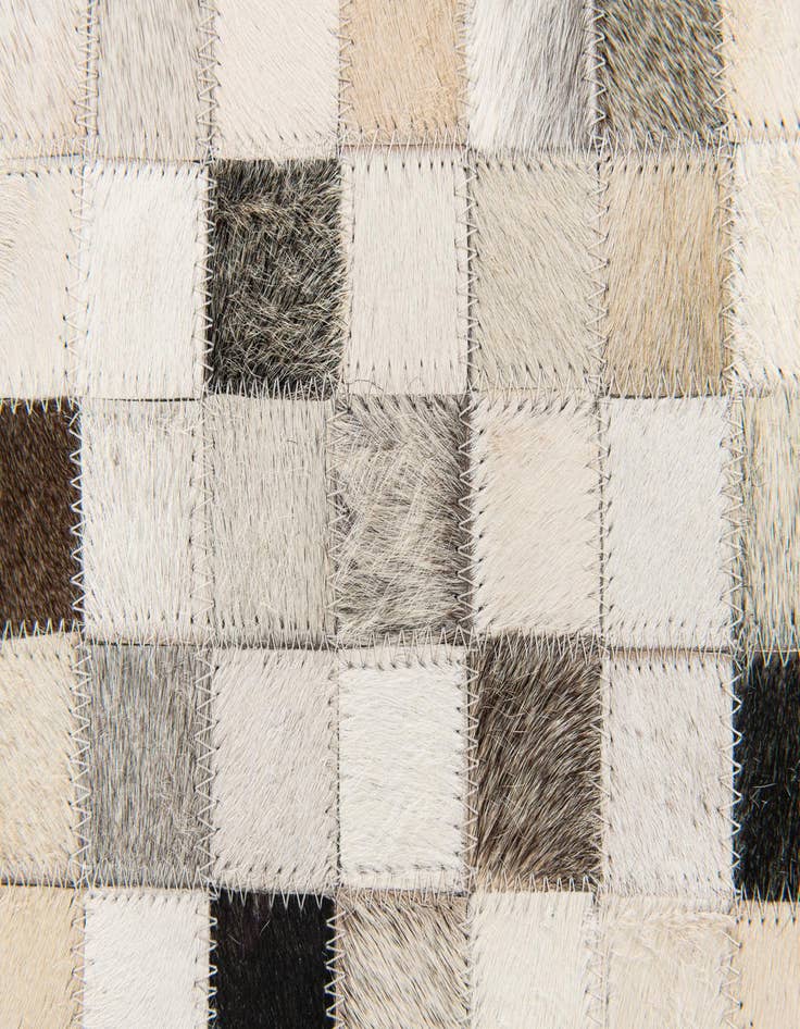 Detail image of 5' x 7' 11 Cowhide Stocks Rug