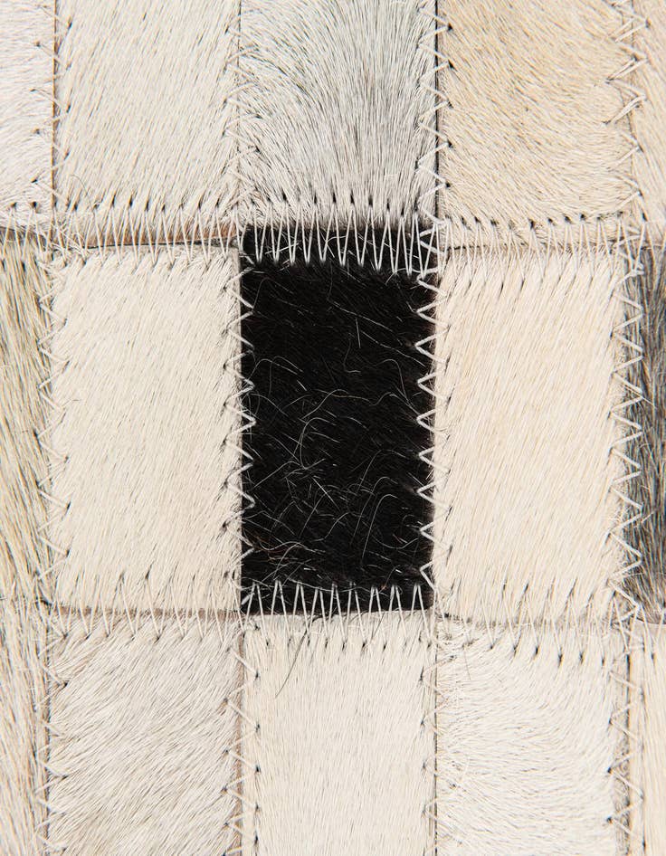 Detail image of 5' x 7' 11 Cowhide Stocks Rug