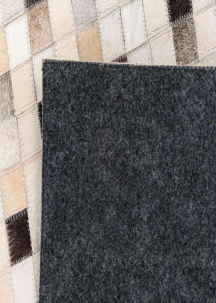 5' x 7' 11 Cowhide Stocks Rug
