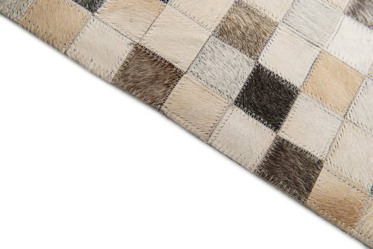 Detail image of 5' 1 x 8' 1 Cowhide Stocks Rug