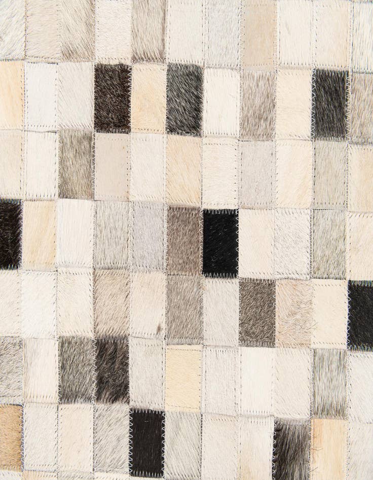 Detail image of 5' 1 x 8' 1 Cowhide Stocks Rug