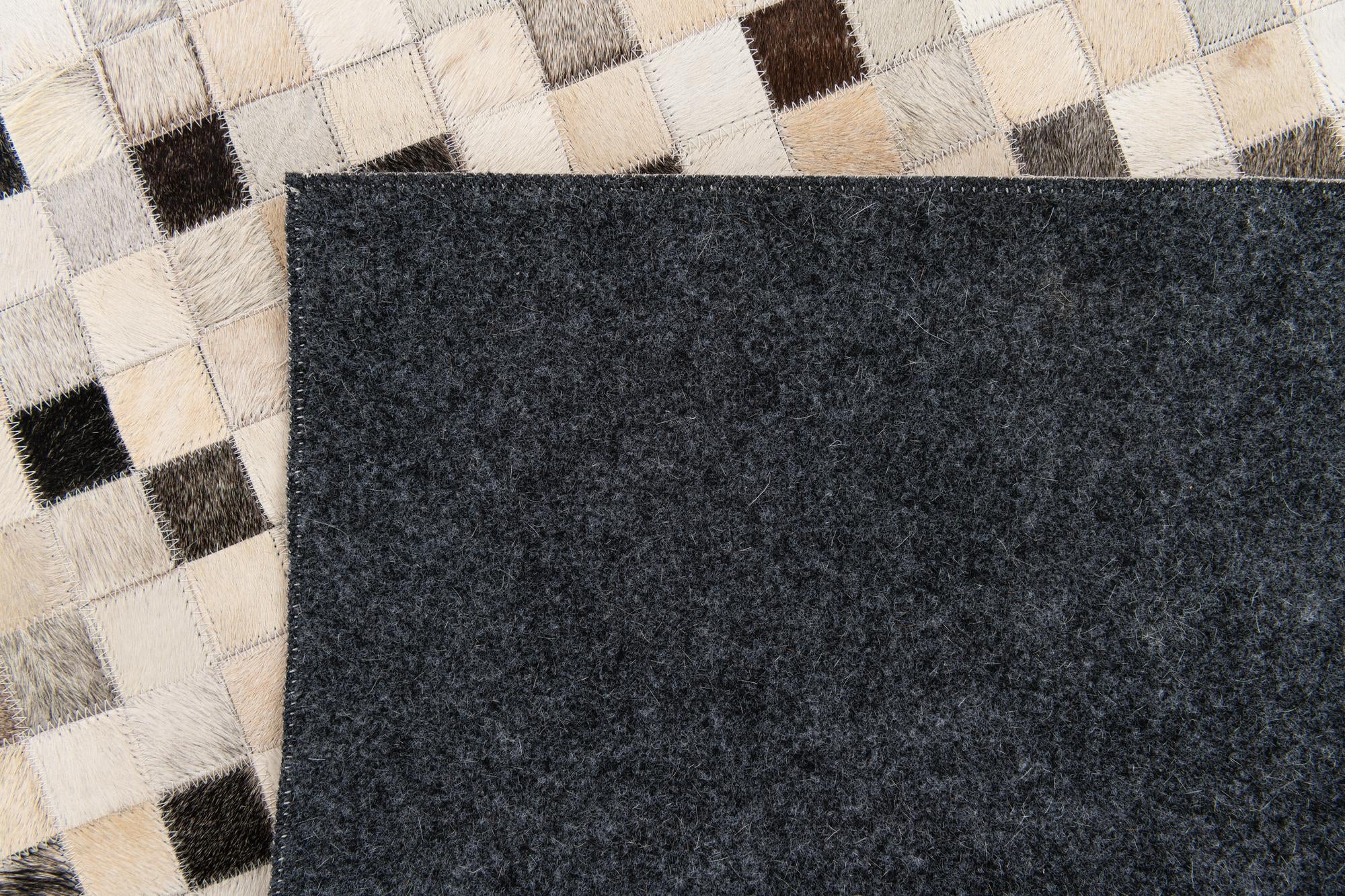 5' 1 x 8' 1 Cowhide Stocks Rug