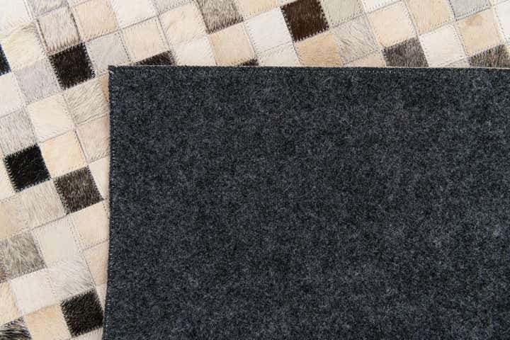 5' 1 x 8' 1 Cowhide Stocks Rug