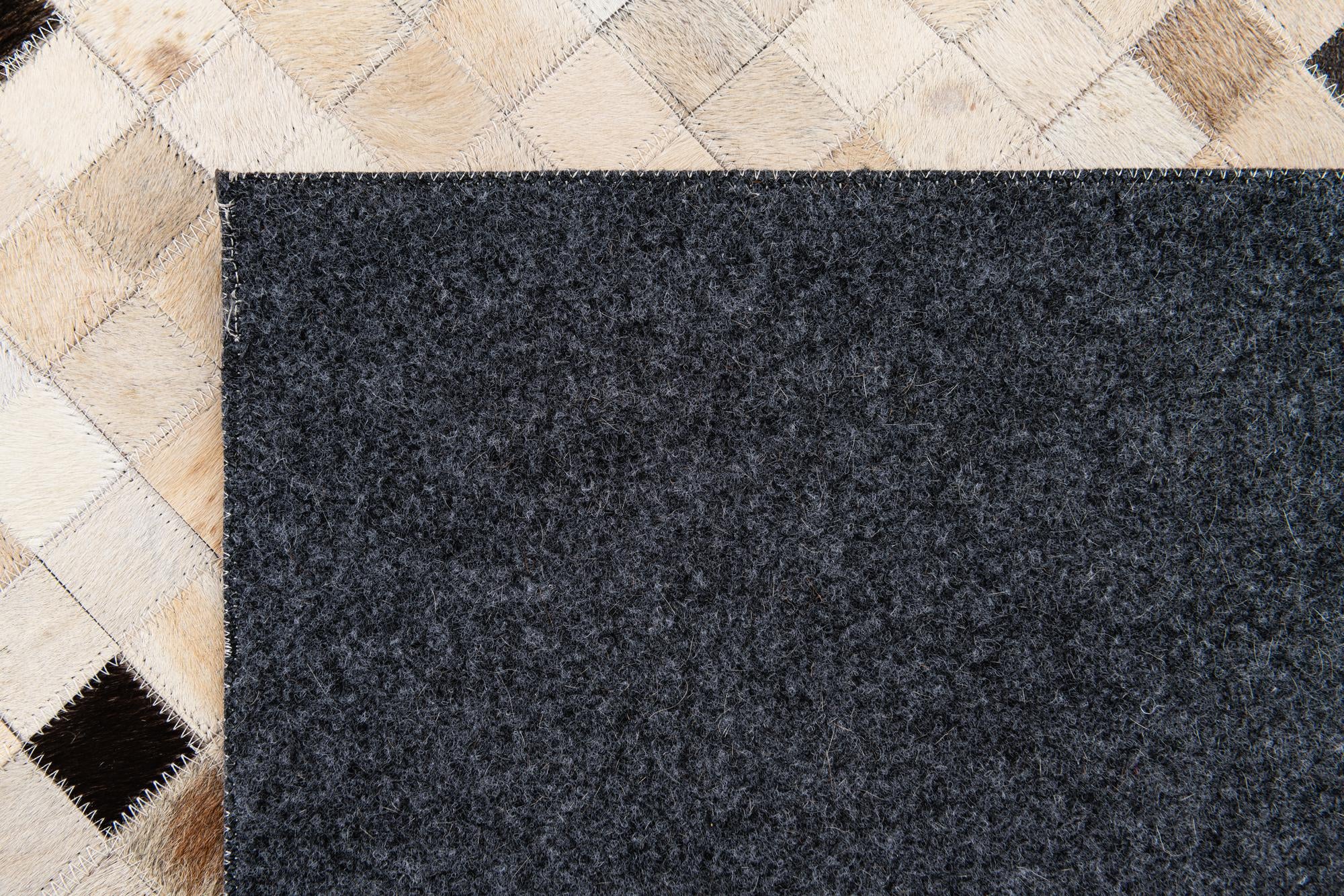5' 4 x 7' 7 Cowhide Stocks Rug