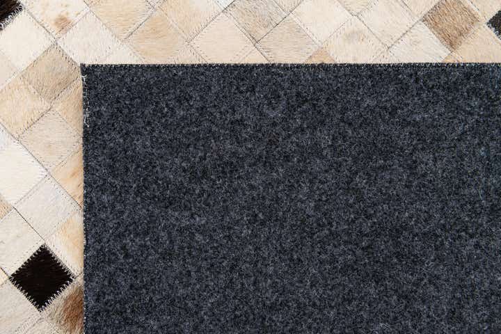 5' 4 x 7' 7 Cowhide Stocks Rug