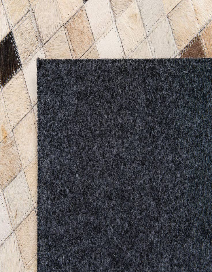 Detail image of 5' 3 x 7' 6 Cowhide Stocks Rug