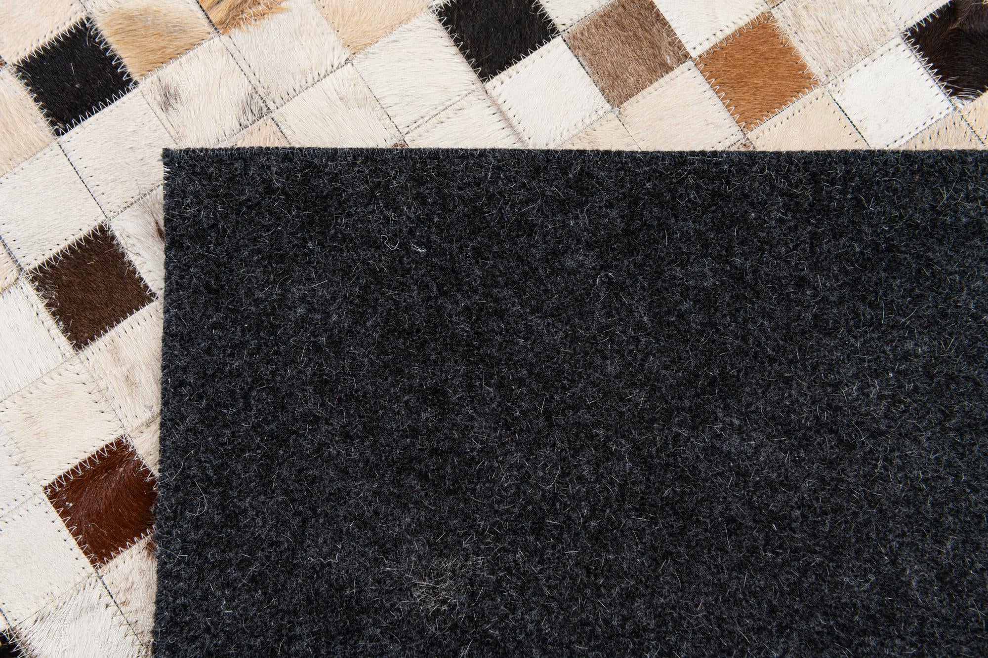 5' 2 x 8' Cowhide Stocks Rug