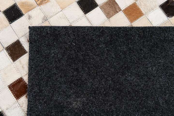 5' 2 x 8' Cowhide Stocks Rug