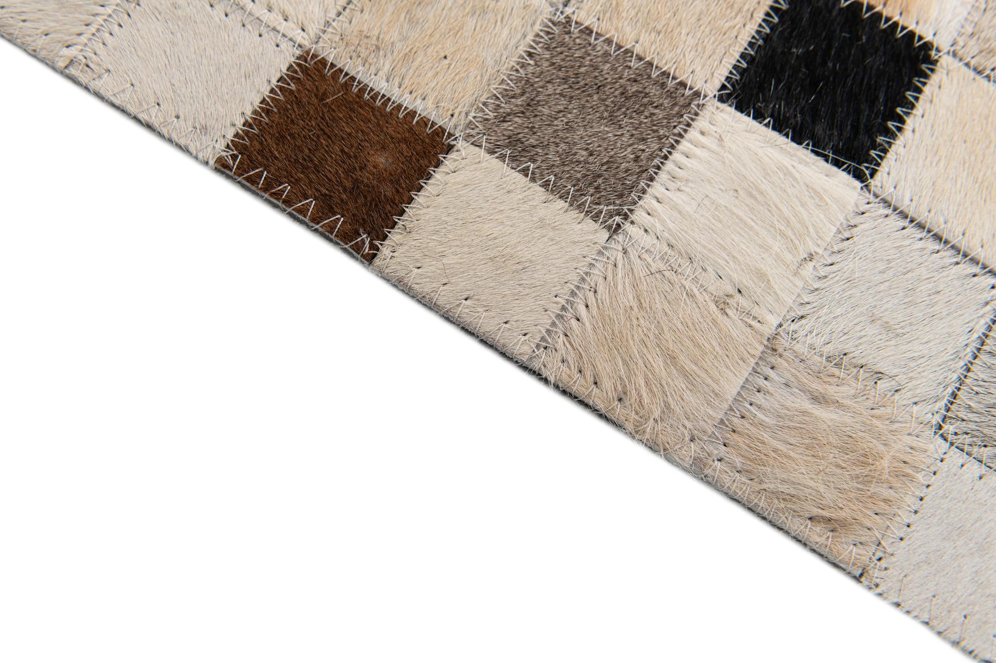 5' x 8' Cowhide Stocks Rug