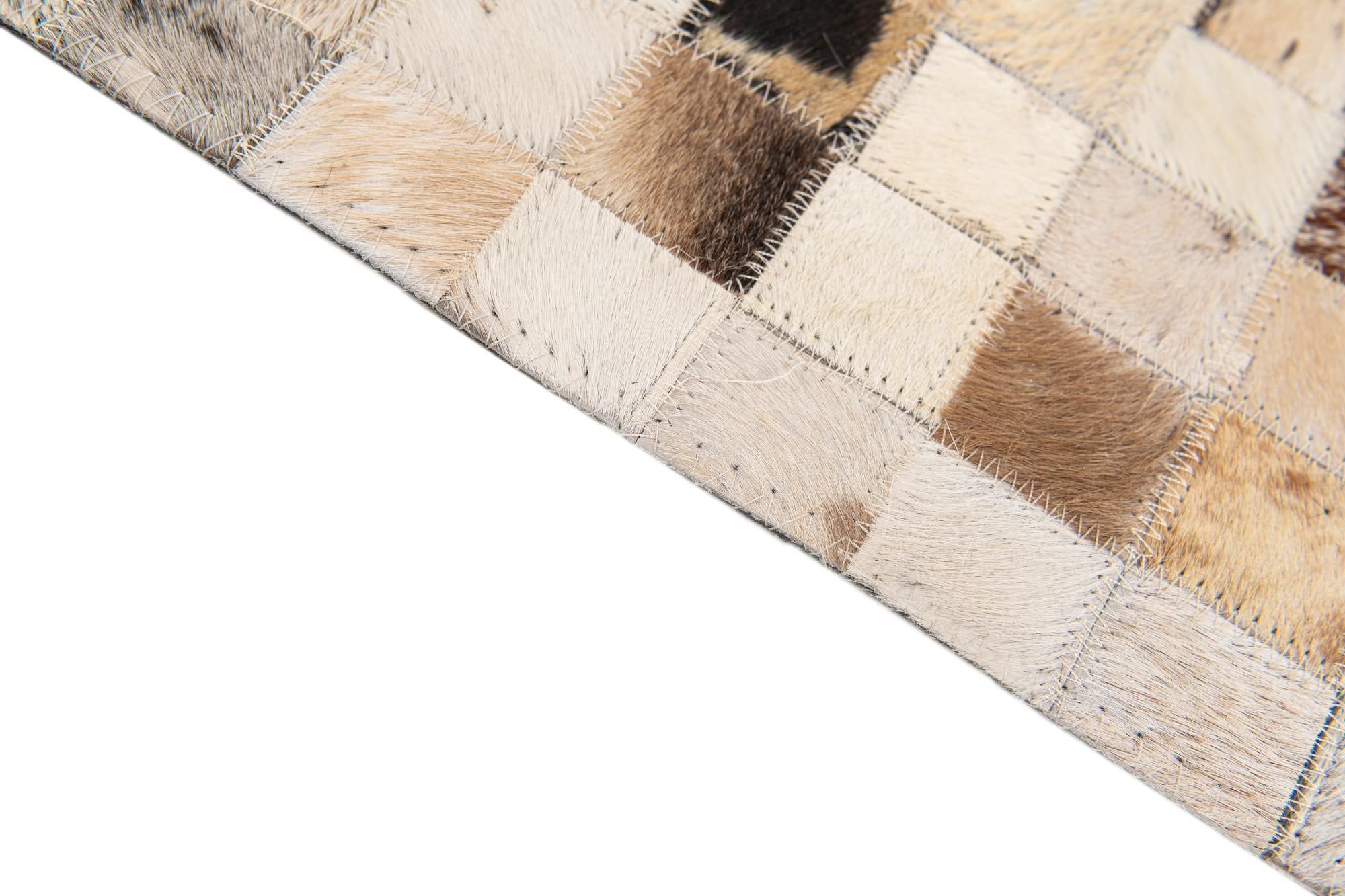 5' 1 x 8' Cowhide Stocks Rug